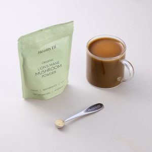 Lion's mane mushroom powder, with custom scoop and coffee